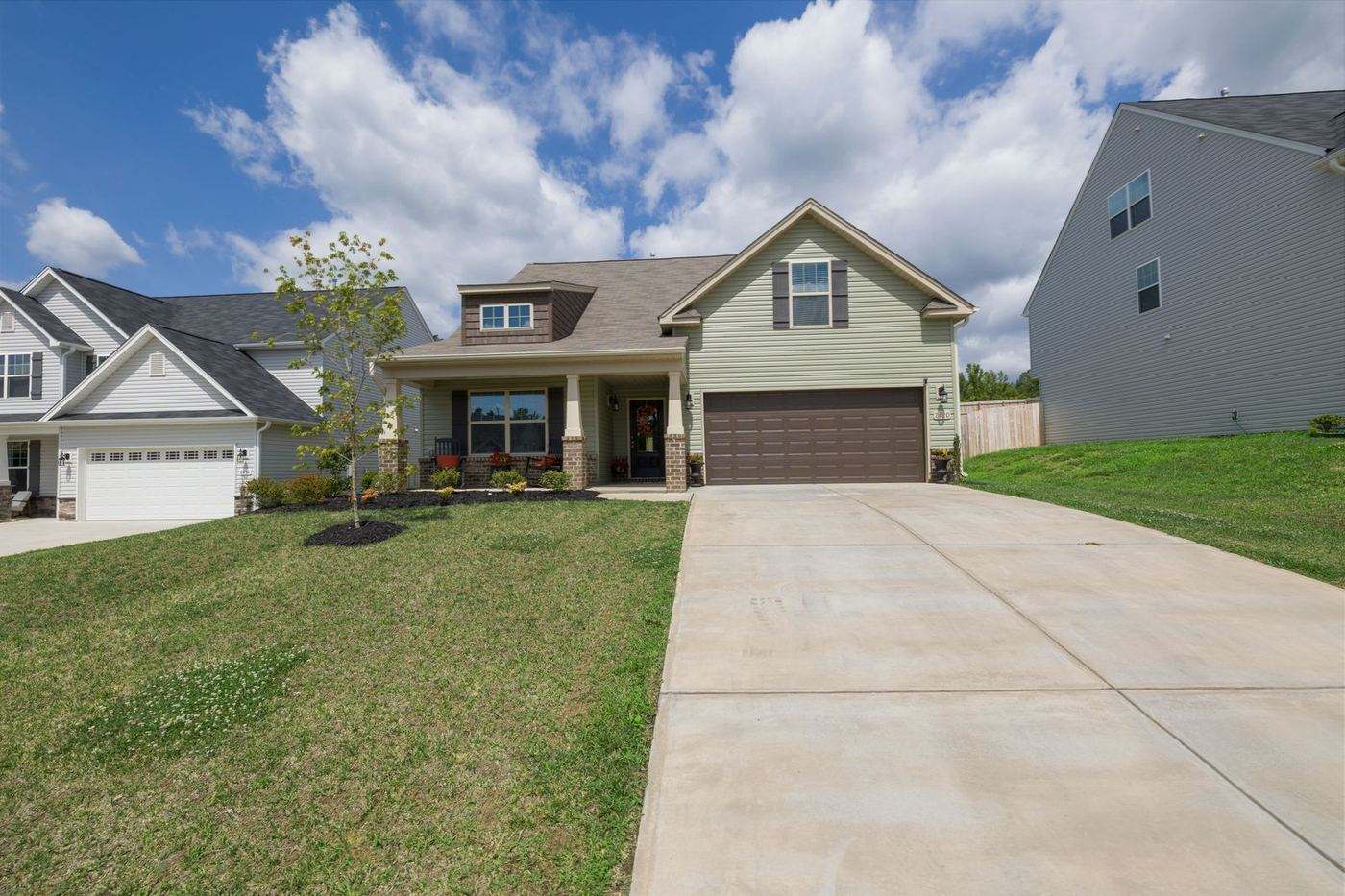 Suburban Waco home with a closed double garage door, the typical starting point for a repair call